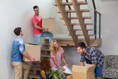 Flat removal team preparing boxes for a Finchley apartment move
