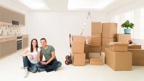 Local removal truck loading items for a move in North London