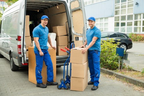 Local moving team handling furniture in Finchley