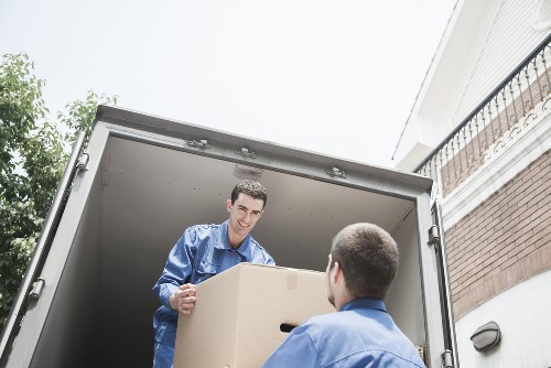 Packed office furniture and equipment ready for transport in Finchley